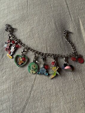Disney charm bracelet with eight authentic Disney charms